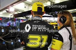 Esteban Ocon (FRA) Renault F1 Team with Aurelie Donzelot (FRA) Renault F1 Team Media Communications Manager in the pits while the race is stopped. 29.11.2020. Formula 1 World Championship, Rd 15, Bahrain Grand Prix, Sakhir, Bahrain, Race Day.