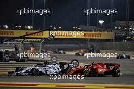 Pierre Gasly (FRA) AlphaTauri AT01 and Charles Leclerc (MON) Ferrari SF1000 battle for position. 29.11.2020. Formula 1 World Championship, Rd 15, Bahrain Grand Prix, Sakhir, Bahrain, Race Day.