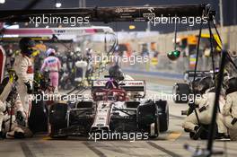 Kimi Raikkonen (FIN) Alfa Romeo Racing C39 makes a pit stop. 29.11.2020. Formula 1 World Championship, Rd 15, Bahrain Grand Prix, Sakhir, Bahrain, Race Day.