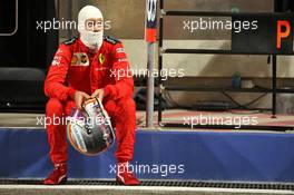 Sebastian Vettel (GER) Ferrari in the pits while the race is stopped. 29.11.2020. Formula 1 World Championship, Rd 15, Bahrain Grand Prix, Sakhir, Bahrain, Race Day.