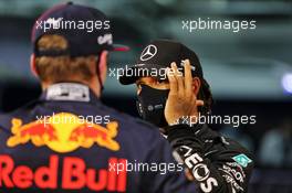 Lewis Hamilton (GBR) Mercedes AMG F1 in qualifying parc ferme with Max Verstappen (NLD) Red Bull Racing. 28.11.2020. Formula 1 World Championship, Rd 15, Bahrain Grand Prix, Sakhir, Bahrain, Qualifying Day.
