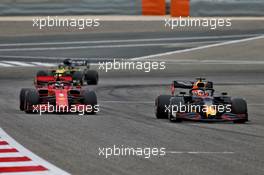 Sebastian Vettel (GER) Ferrari SF1000 and Max Verstappen (NLD) Red Bull Racing RB16. 28.11.2020. Formula 1 World Championship, Rd 15, Bahrain Grand Prix, Sakhir, Bahrain, Qualifying Day.