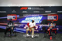 (L to R): Valtteri Bottas (FIN) Mercedes AMG F1; Lewis Hamilton (GBR) Mercedes AMG F1; and Max Verstappen (NLD) Red Bull Racing, in the post qualifying FIA Press Conference. 28.11.2020. Formula 1 World Championship, Rd 15, Bahrain Grand Prix, Sakhir, Bahrain, Qualifying Day.