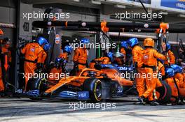 Carlos Sainz Jr (ESP) McLaren MCL35 makes a pit stop. 16.08.2020. Formula 1 World Championship, Rd 6, Spanish Grand Prix, Barcelona, Spain, Race Day.