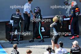 (L to R): Valtteri Bottas (FIN) Mercedes AMG F1; Lewis Hamilton (GBR) Mercedes AMG F1; and Max Verstappen (NLD) Red Bull Racing in qualifying parc ferme. 15.08.2020. Formula 1 World Championship, Rd 6, Spanish Grand Prix, Barcelona, Spain, Qualifying Day.