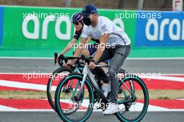 Valtteri Bottas (FIN) Mercedes AMG F1 rides the circuit with his girlfriend Tiffany Cromwell (AUS) Professional Cyclist. 13.08.2020. Formula 1 World Championship, Rd 6, Spanish Grand Prix, Barcelona, Spain, Preparation Day.