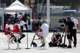 Kimi Raikkonen (FIN) Alfa Romeo Racing and Antonio Giovinazzi (ITA) Alfa Romeo Racing with Will Buxton (GBR) F1 Digital Presenter. 13.08.2020. Formula 1 World Championship, Rd 6, Spanish Grand Prix, Barcelona, Spain, Preparation Day.