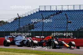 Alexander Albon (THA) Red Bull Racing RB16 leads George Russell (GBR) Williams Racing FW43. 31.07.2020. Formula 1 World Championship, Rd 4, British Grand Prix, Silverstone, England, Practice Day.