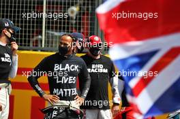 (L to R): Nicholas Latifi (CDN) Williams Racing and Lewis Hamilton (GBR) Mercedes AMG F1 on the grid. 02.08.2020. Formula 1 World Championship, Rd 4, British Grand Prix, Silverstone, England, Race Day.