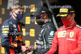 Max Verstappen (NLD) Red Bull Racing RB16 with Lewis Hamilton (GBR) Mercedes AMG F1 W11 and Charles Leclerc (MON) Ferrari SF1000. 02.08.2020. Formula 1 World Championship, Rd 4, British Grand Prix, Silverstone, England, Race Day.