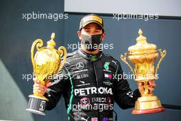 Race winner Lewis Hamilton (GBR) Mercedes AMG F1 celebrates on the podium. 02.08.2020. Formula 1 World Championship, Rd 4, British Grand Prix, Silverstone, England, Race Day.