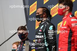 Max Verstappen (NLD) Red Bull Racing RB16 with Lewis Hamilton (GBR) Mercedes AMG F1 W11 and Charles Leclerc (MON) Ferrari SF1000. 02.08.2020. Formula 1 World Championship, Rd 4, British Grand Prix, Silverstone, England, Race Day.