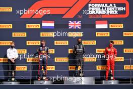 The podium (L to R): Gilles Pironi (FRA) Mercedes AMG F1; Max Verstappen (NLD) Red Bull Racing, second; Lewis Hamilton (GBR) Mercedes AMG F1, race winner; Charles Leclerc (MON) Ferrari, third. 02.08.2020. Formula 1 World Championship, Rd 4, British Grand Prix, Silverstone, England, Race Day.