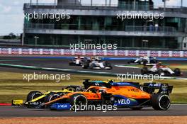 Daniel Ricciardo (AUS) Renault F1 Team RS20 and Lando Norris (GBR) McLaren MCL35 battle for position. 02.08.2020. Formula 1 World Championship, Rd 4, British Grand Prix, Silverstone, England, Race Day.
