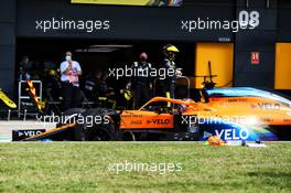Carlos Sainz Jr (ESP) McLaren MCL35 with a puncture in the pits. 02.08.2020. Formula 1 World Championship, Rd 4, British Grand Prix, Silverstone, England, Race Day.