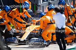 Carlos Sainz Jr (ESP) McLaren MCL35 makes a pit stop. 02.08.2020. Formula 1 World Championship, Rd 4, British Grand Prix, Silverstone, England, Race Day.