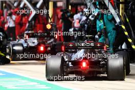 Lewis Hamilton (GBR) Mercedes AMG F1 W11 and Valtteri Bottas (FIN) Mercedes AMG F1 make a pit stop. 02.08.2020. Formula 1 World Championship, Rd 4, British Grand Prix, Silverstone, England, Race Day.