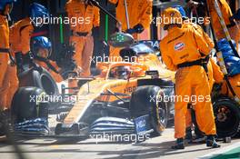 Carlos Sainz Jr (ESP) McLaren MCL35 makes a pit stop. 02.08.2020. Formula 1 World Championship, Rd 4, British Grand Prix, Silverstone, England, Race Day.