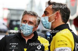 (L to R): Pat Fry (GBR) Renault F1 Team Technical Director (Chassis) with Cyril Abiteboul (FRA) Renault Sport F1 Managing Director. 02.08.2020. Formula 1 World Championship, Rd 4, British Grand Prix, Silverstone, England, Race Day.