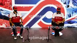 (L to R): Antonio Giovinazzi (ITA) Alfa Romeo Racing and team mate Kimi Raikkonen (FIN) Alfa Romeo Racing in the FIA Press Conference. 30.07.2020. Formula 1 World Championship, Rd 4, British Grand Prix, Silverstone, England, Preparation Day.