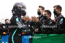Race winner Lewis Hamilton (GBR) Mercedes AMG F1 celebrates with the team in parc ferme. 11.10.2020. Formula 1 World Championship, Rd 11, Eifel Grand Prix, Nurbugring, Germany, Race Day.