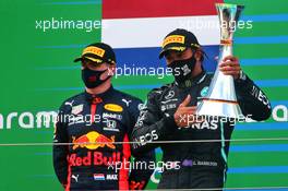 Race winner Lewis Hamilton (GBR) Mercedes AMG F1 celebrates on the podium with Max Verstappen (NLD) Red Bull Racing. 11.10.2020. Formula 1 World Championship, Rd 11, Eifel Grand Prix, Nurbugring, Germany, Race Day.