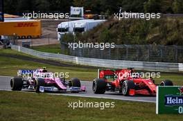 Sebastian Vettel (GER) Ferrari SF1000 and Nico Hulkenberg (GER) Racing Point F1 Team RP20 battle for position. 11.10.2020. Formula 1 World Championship, Rd 11, Eifel Grand Prix, Nurbugring, Germany, Race Day.