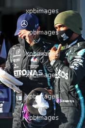 (L to R): Valtteri Bottas (FIN) Mercedes AMG F1 with team mate Lewis Hamilton (GBR) Mercedes AMG F1 in qualifying parc ferme. 10.10.2020. Formula 1 World Championship, Rd 11, Eifel Grand Prix, Nurbugring, Germany, Qualifying Day.
