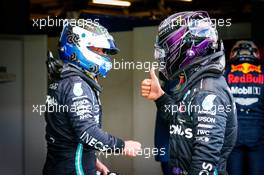 (L to R): Valtteri Bottas (FIN) Mercedes AMG F1 celebrates his pole position in qualifying parc ferme with second placed team mate Lewis Hamilton (GBR) Mercedes AMG F1. 10.10.2020. Formula 1 World Championship, Rd 11, Eifel Grand Prix, Nurbugring, Germany, Qualifying Day.