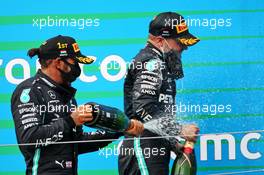 Race winner Lewis Hamilton (GBR) Mercedes AMG F1 celebrates on the podium with team mate Valtteri Bottas (FIN) Mercedes AMG F1. 19.07.2020. Formula 1 World Championship, Rd 3, Hungarian Grand Prix, Budapest, Hungary, Race Day.
