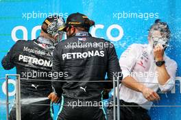 Race winner Lewis Hamilton (GBR) Mercedes AMG F1 celebrates on the podium with Valtteri Bottas (FIN) Mercedes AMG F1 and Peter Bonnington (GBR) Mercedes AMG F1 Race Engineer. 19.07.2020. Formula 1 World Championship, Rd 3, Hungarian Grand Prix, Budapest, Hungary, Race Day.