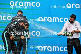 (L to R): Race winner Lewis Hamilton (GBR) Mercedes AMG F1 celebrates with third placed team mate Valtteri Bottas (FIN) Mercedes AMG F1 and Peter Bonnington (GBR) Mercedes AMG F1 Race Engineer. 19.07.2020. Formula 1 World Championship, Rd 3, Hungarian Grand Prix, Budapest, Hungary, Race Day.