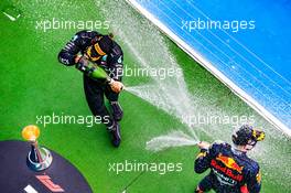 (L to R): Race winner Lewis Hamilton (GBR) Mercedes AMG F1 celebrates on the podium with second placed Max Verstappen (NLD) Red Bull Racing. 19.07.2020. Formula 1 World Championship, Rd 3, Hungarian Grand Prix, Budapest, Hungary, Race Day.