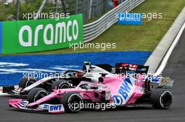 Kevin Magnussen (DEN) Haas VF-20 and Sergio Perez (MEX) Racing Point F1 Team RP19 battle for position. 19.07.2020. Formula 1 World Championship, Rd 3, Hungarian Grand Prix, Budapest, Hungary, Race Day.