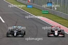 Valtteri Bottas (FIN) Mercedes AMG F1 W11 and Kevin Magnussen (DEN) Haas VF-20 battle for position. 19.07.2020. Formula 1 World Championship, Rd 3, Hungarian Grand Prix, Budapest, Hungary, Race Day.