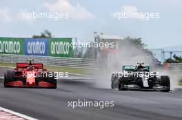 Charles Leclerc (MON) Ferrari SF1000 and Valtteri Bottas (FIN) Mercedes AMG F1 W11. 19.07.2020. Formula 1 World Championship, Rd 3, Hungarian Grand Prix, Budapest, Hungary, Race Day.