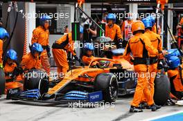 Lando Norris (GBR) McLaren MCL35 makes a pit stop. 19.07.2020. Formula 1 World Championship, Rd 3, Hungarian Grand Prix, Budapest, Hungary, Race Day.