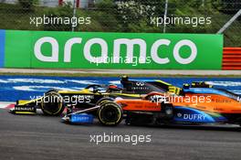Esteban Ocon (FRA) Renault F1 Team RS20 and Lando Norris (GBR) McLaren MCL35 battle for position. 19.07.2020. Formula 1 World Championship, Rd 3, Hungarian Grand Prix, Budapest, Hungary, Race Day.