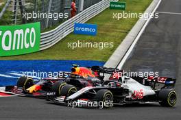 Alexander Albon (THA) Red Bull Racing RB16 and Romain Grosjean (FRA) Haas F1 Team VF-20 battle for position. 19.07.2020. Formula 1 World Championship, Rd 3, Hungarian Grand Prix, Budapest, Hungary, Race Day.