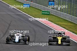George Russell (GBR) Williams Racing FW43 and Esteban Ocon (FRA) Renault F1 Team RS20 battle for position. 19.07.2020. Formula 1 World Championship, Rd 3, Hungarian Grand Prix, Budapest, Hungary, Race Day.