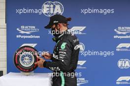 Lewis Hamilton (GBR) Mercedes AMG F1 celebrates his pole position in qualifying parc ferme with the Pirelli trophy. 18.07.2020. Formula 1 World Championship, Rd 3, Hungarian Grand Prix, Budapest, Hungary, Qualifying Day.