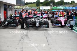 The top three cars in qualifying parc ferme (L to R): Valtteri Bottas (FIN) Mercedes AMG F1 W11; Lewis Hamilton (GBR) Mercedes AMG F1 W11; Lance Stroll (CDN) Racing Point F1 Team RP20. 18.07.2020. Formula 1 World Championship, Rd 3, Hungarian Grand Prix, Budapest, Hungary, Qualifying Day.