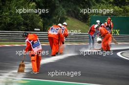 An oil spill is dealt with by marshals during the stopped F3 race. 18.07.2020. Formula 1 World Championship, Rd 3, Hungarian Grand Prix, Budapest, Hungary, Qualifying Day.