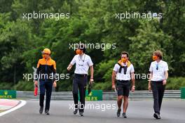 Lando Norris (GBR) McLaren walks the circuit with the team. 16.07.2020. Formula 1 World Championship, Rd 3, Hungarian Grand Prix, Budapest, Hungary, Preparation Day.