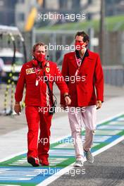 (L to R): Gino Rosato (CDN) Ferrari with John Elkann (ITA) FIAT Chrysler Automobiles Chairman. 01.11.2020. Formula 1 World Championship, Rd 13, Emilia Romagna Grand Prix, Imola, Italy, Race Day.