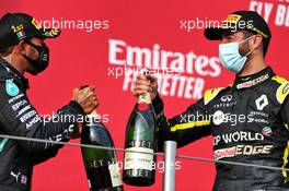(L to R): race winner Lewis Hamilton (GBR) Mercedes AMG F1 celebrates on the podium with third placed Daniel Ricciardo (AUS) Renault F1 Team. 01.11.2020. Formula 1 World Championship, Rd 13, Emilia Romagna Grand Prix, Imola, Italy, Race Day.