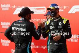 (L to R): race winner Lewis Hamilton (GBR) Mercedes AMG F1 celebrates with third placed Daniel Ricciardo (AUS) Renault F1 Team in parc ferme. 01.11.2020. Formula 1 World Championship, Rd 13, Emilia Romagna Grand Prix, Imola, Italy, Race Day.