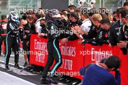 Race winner Lewis Hamilton (GBR) Mercedes AMG F1 celebrates with the team in parc ferme. 01.11.2020. Formula 1 World Championship, Rd 13, Emilia Romagna Grand Prix, Imola, Italy, Race Day.