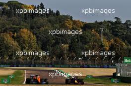 Lando Norris (GBR) McLaren MCL35 and Max Verstappen (NLD) Red Bull Racing RB16. 31.10.2020. Formula 1 World Championship, Rd 13, Emilia Romagna Grand Prix, Imola, Italy, Qualifying Day.