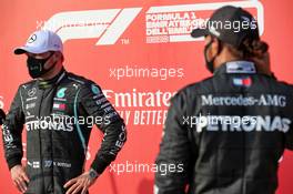 (L to R): Valtteri Bottas (FIN) Mercedes AMG F1 and team mate Lewis Hamilton (GBR) Mercedes AMG F1 in qualifying parc ferme. 31.10.2020. Formula 1 World Championship, Rd 13, Emilia Romagna Grand Prix, Imola, Italy, Qualifying Day.
